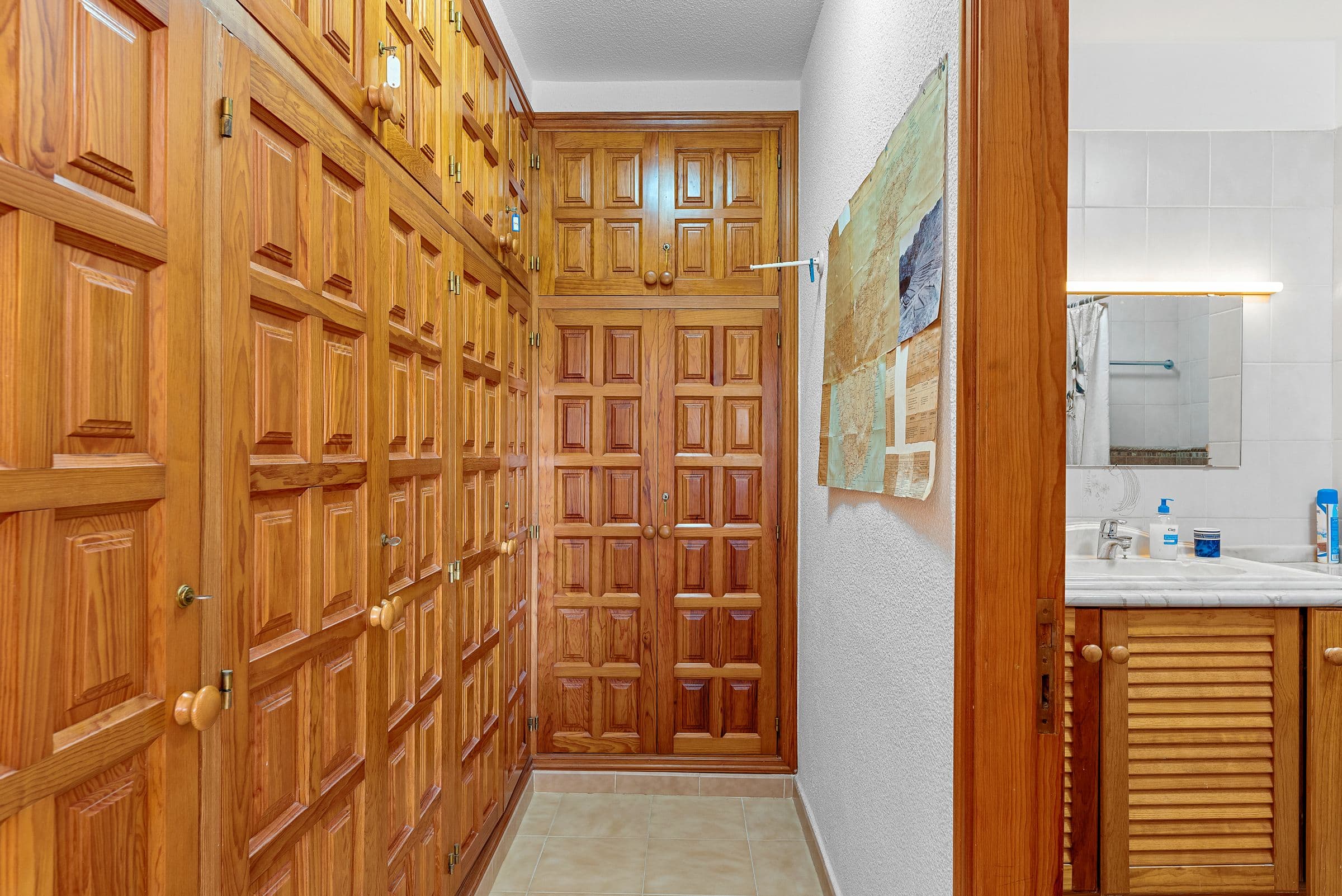 Hallway with built-in wardrobes