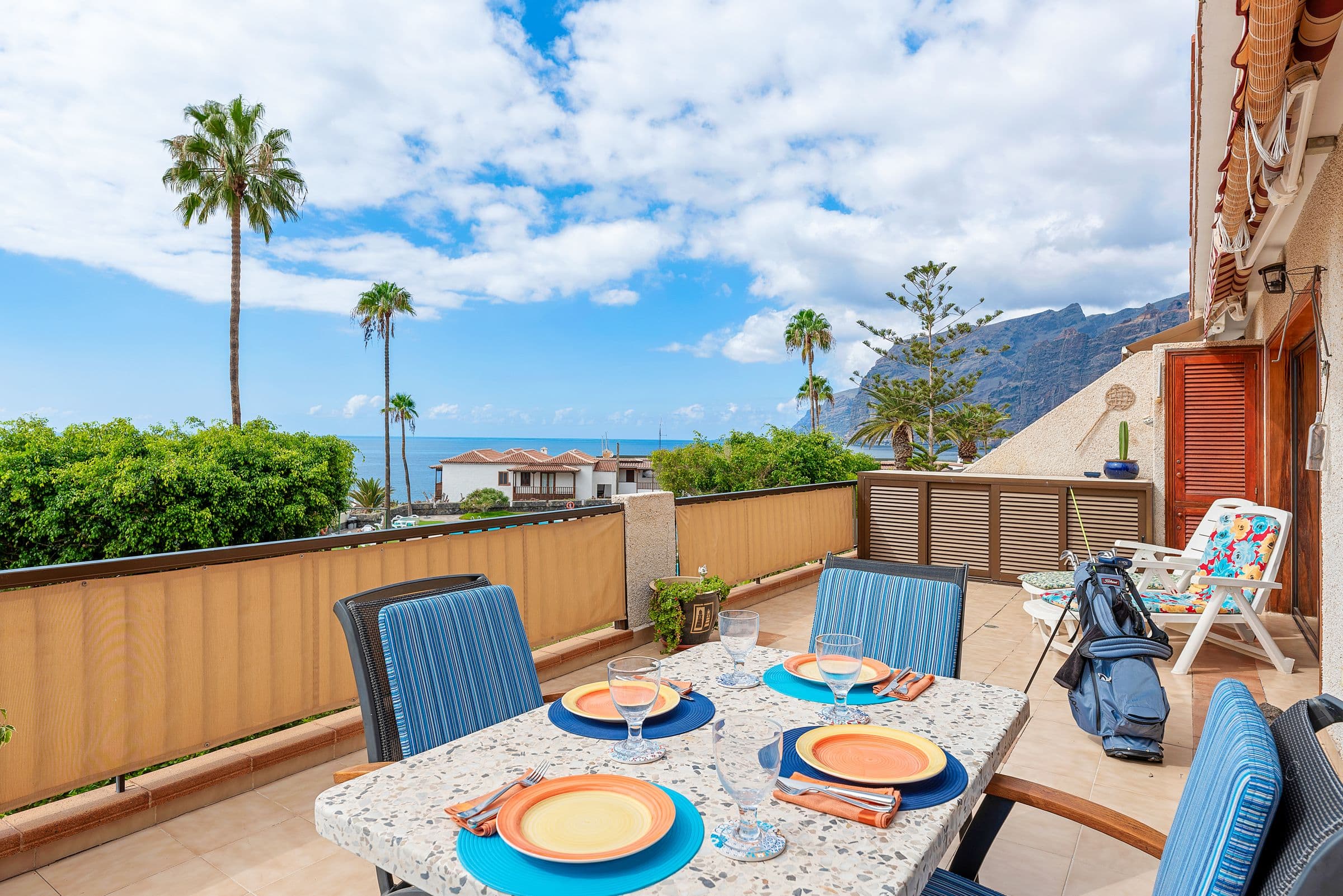 Table set on the terrace facing the cliffs